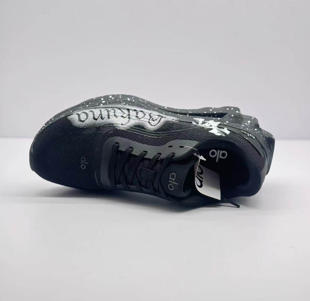 ALO running Black and white graffiti shoes